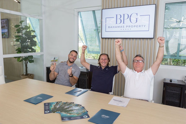 blue water cay developers celebrating closing