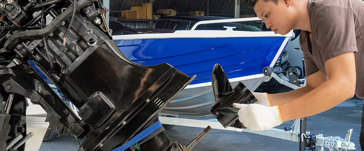 Bahamas Marina Employee servicing boat